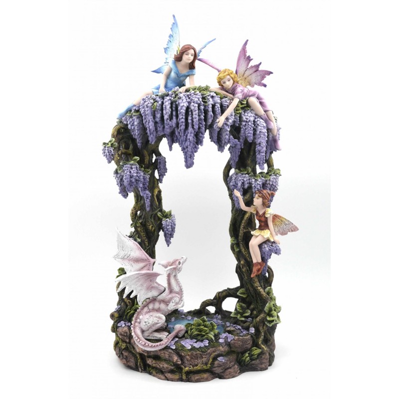 3 Petites fées  sur un arche de glycine et leur dragon
