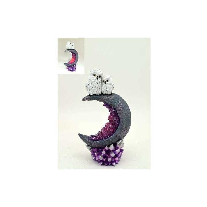 chouette sur lune lumineuse