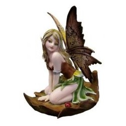 Fée à genoux sur une...