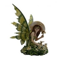 Fée de fleurs et son chapeau