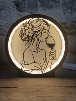 Lampe ronde lumineuse noire avec silhouette d'une femme buvant un verre de vin
