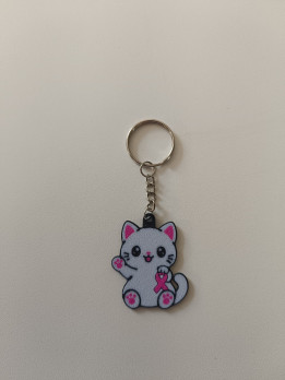 Porte-clés chaton gris en impression 3D tenant un ruban rose solidaire