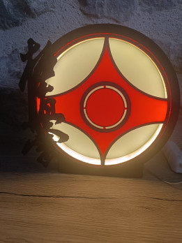Lampe ronde noire avec silhouette ajourée de l'île Madinina 972 et motif fleur